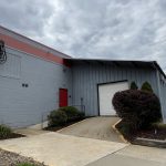 Entrance to gray industrial building in Uniontown